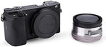 Hot shoe cover sliding into a mirrorless camera top mount for oxidation defense