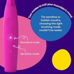 Burst Kids pink electronic toothbrush showing the two specialized brushing mode buttons