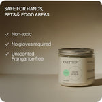 Everneat heavy-duty degreasing paste being wiped off cast iron cookware