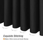 Gibelle hotel spa luxury black fabric curtain installed with twelve hooks on a standard shower rod.