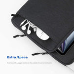 Dadanism tablet sleeve carried on shoulder