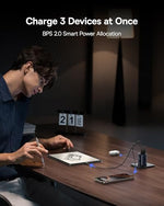 Baseus travel companion charger plugged into a wall outlet without blocking sockets