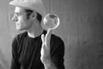 An overhead view showing the precise dimensions of the imported 2.75-inch transparent juggling sphere.