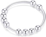 Lifestyle presentation of stress relief jewelry item