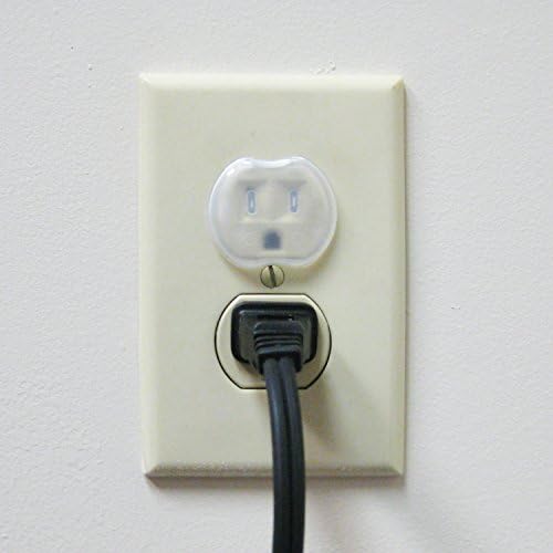 White wall socket with transparent safety plug installed