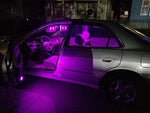 Vibrant purple illumination effect inside a vehicle dome light housing using BRISHINE