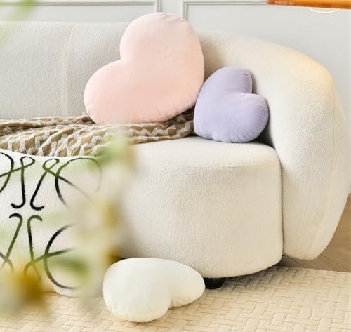 Petrella aesthetic preppy heart pillow on bed