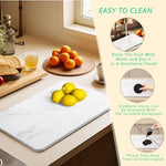 HMGDZ absorbent stone dish drying mat highlighting porous material texture.