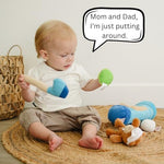 Blue plush golf bag for babies showing embroidered details