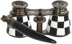 Vintage brass theater binoculars with black and white enamel