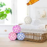 Demonstration of the zero shed silicone exterior protecting the natural wool core of the laundry accessory.