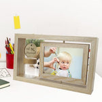 Liannan baby photo frame showing the glass hair preservation jar with baby hair inside.