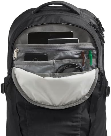 The North Face Recon backpack interior compartment showing the dedicated fifteen-inch laptop sleeve and organized tech pockets