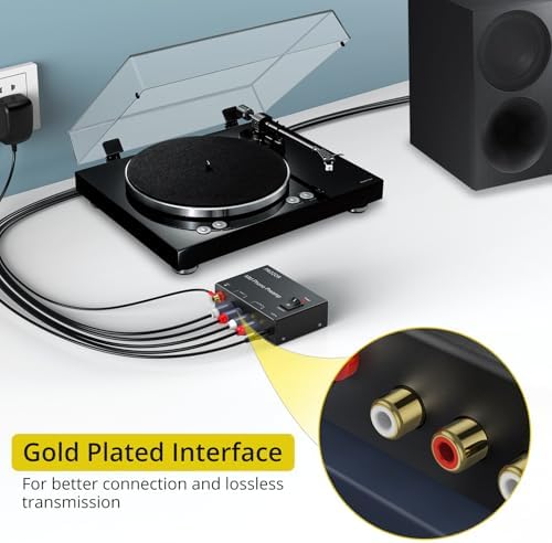 PROZOR moving magnet stereo preamp alongside its certified twelve volt DC power adapter and user manual