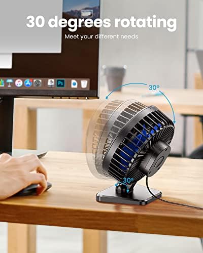 Gaiatop mini desktop fan connected to a laptop via USB cable on a modern workspace setup.