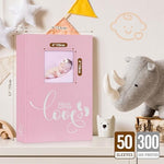 Lanpn pink newborn memory book open page layout displaying horizontal photo pockets and memo writing area.