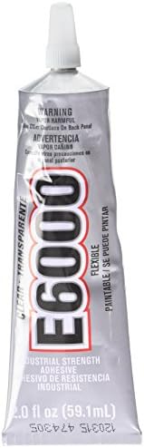 Close up of 2 fluid ounce E-6000 clear adhesive tube in packaging