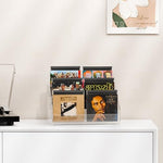 High transparency clear plastic shelf showcasing organized music jewel cases in a modern home office space.