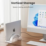 Yikola vertical notebook dock holding a silver MacBook on a modern workstation