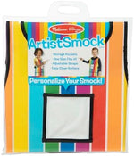 Close up view of the roomy storage pockets on the Melissa and Doug multicolor artist smock.