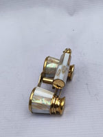 Close up view detailing the genuine mother of pearl craftsmanship on the functional spyglass scope body.