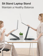 Tounee sit to stand laptop riser extended to maximum height with MacBook Pro