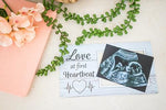 Close up view of the script lettering and heart EKG graphic on the Brothers Bench frame