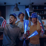 Group of people holding blue fiber optic wands at a party