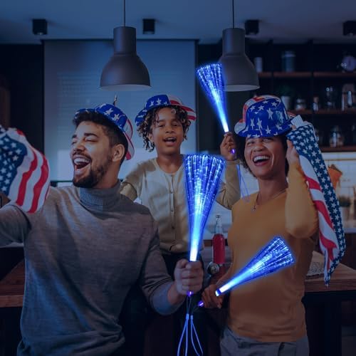 Group of people holding blue fiber optic wands at a party