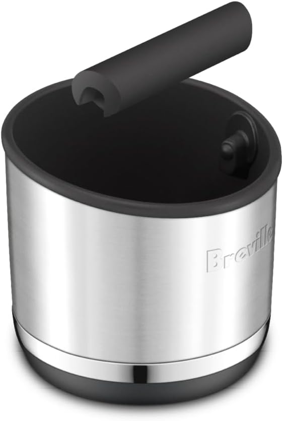 Breville stainless steel coffee puck container angled view