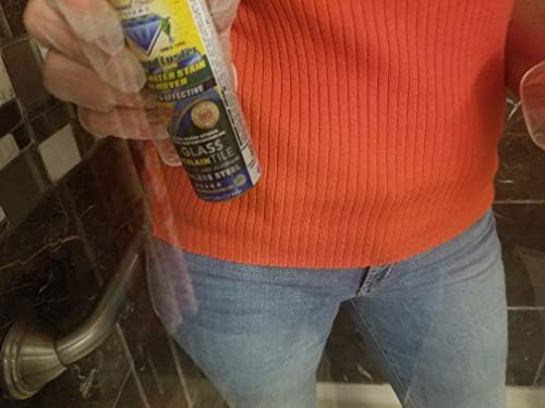 Three-M white buffing pad and specialized applicator pad included in the DIY shower door restoration kit.