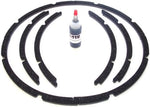 Close up of Rubitex speaker gasket material and adhesive bottle