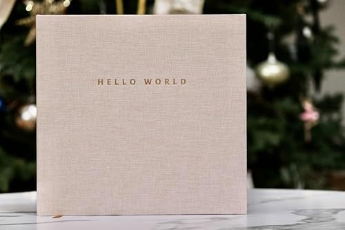 Minimalist gender neutral milestone photo album showing premium linen fabric texture