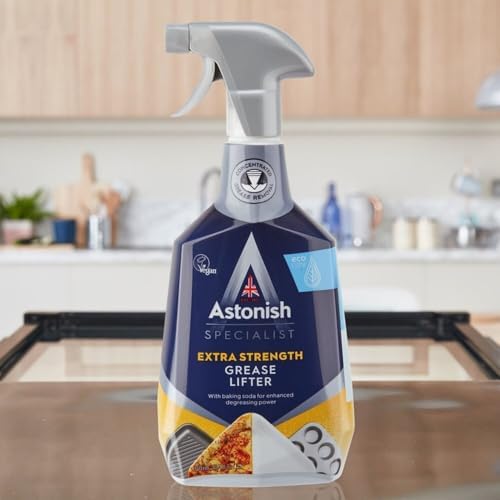Astonish Specialist Grease Lifter spray being applied to a greasy cooker hood