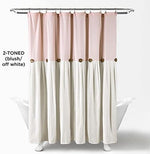 Close up view of the pleated color block details and coconut buttons on the Lush Decor curtain.