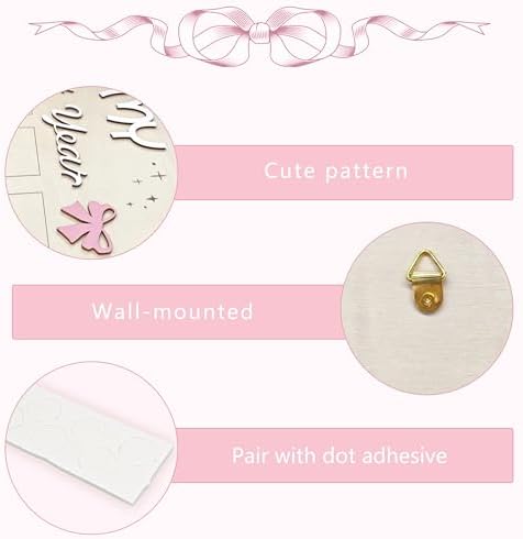 Close up of the monthly slots on the baby girl first birthday board