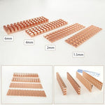 Copper heatsink with silicone thermal pad and rubber retention rings.