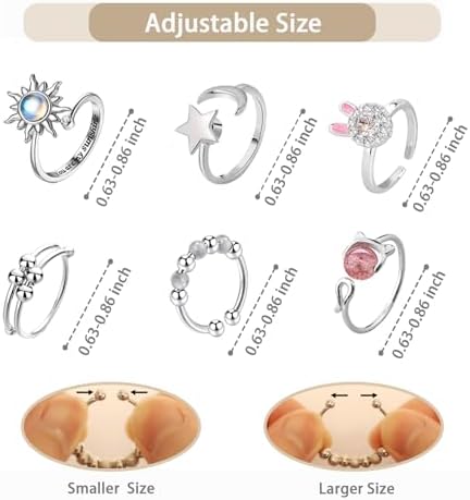 Six pieces of adjustable anti-stress rings displaying moon and star celestial designs.