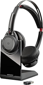 Poly Voyager Focus UC Teams version headset on desktop charging dock