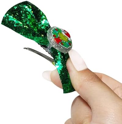 Open view of the Grinch hair accessory kit revealing seventy five mini elastics and eight hair terries.