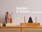Close up of the hypoallergenic natural wood pieces of the BSIRI Tower of Hanoi strategy puzzle.