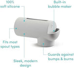 Water flowing cleanly through the Munchkin universal infant safety faucet cover.