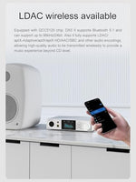 Compact high-end home studio DAC system showing multiple headphone jack outputs setup