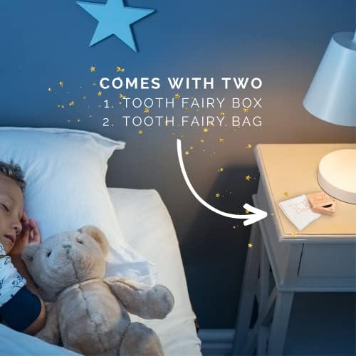 Child holding 20 Moments of Tooth keepsake box