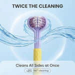 Blue and pink polka dot kids toothbrush with ergonomic non-slip handle.