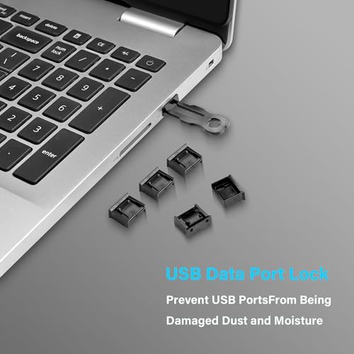 Close up view of the black polypropylene USB dustproof plugs protecting computer hardware connections.
