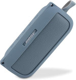 co2CREA speaker sleeve showing the adjustable shoulder strap attachment for hands-free carrying.
