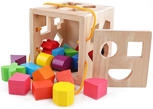 Toddler educational matching cube with 19 colorful non-toxic wooden blocks scattered around.