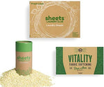 Sheets Laundry Club detergent sheet dissolving in water showing quick-release technology.