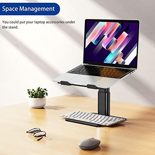 Heavy duty aluminum computer riser holding a fifteen point six inch professional laptop